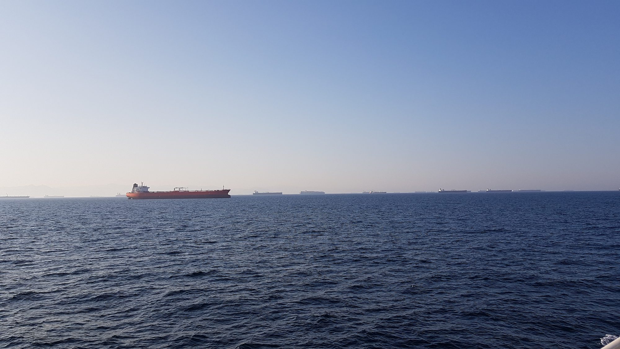 Countless cargo ships in the strait of hormuz