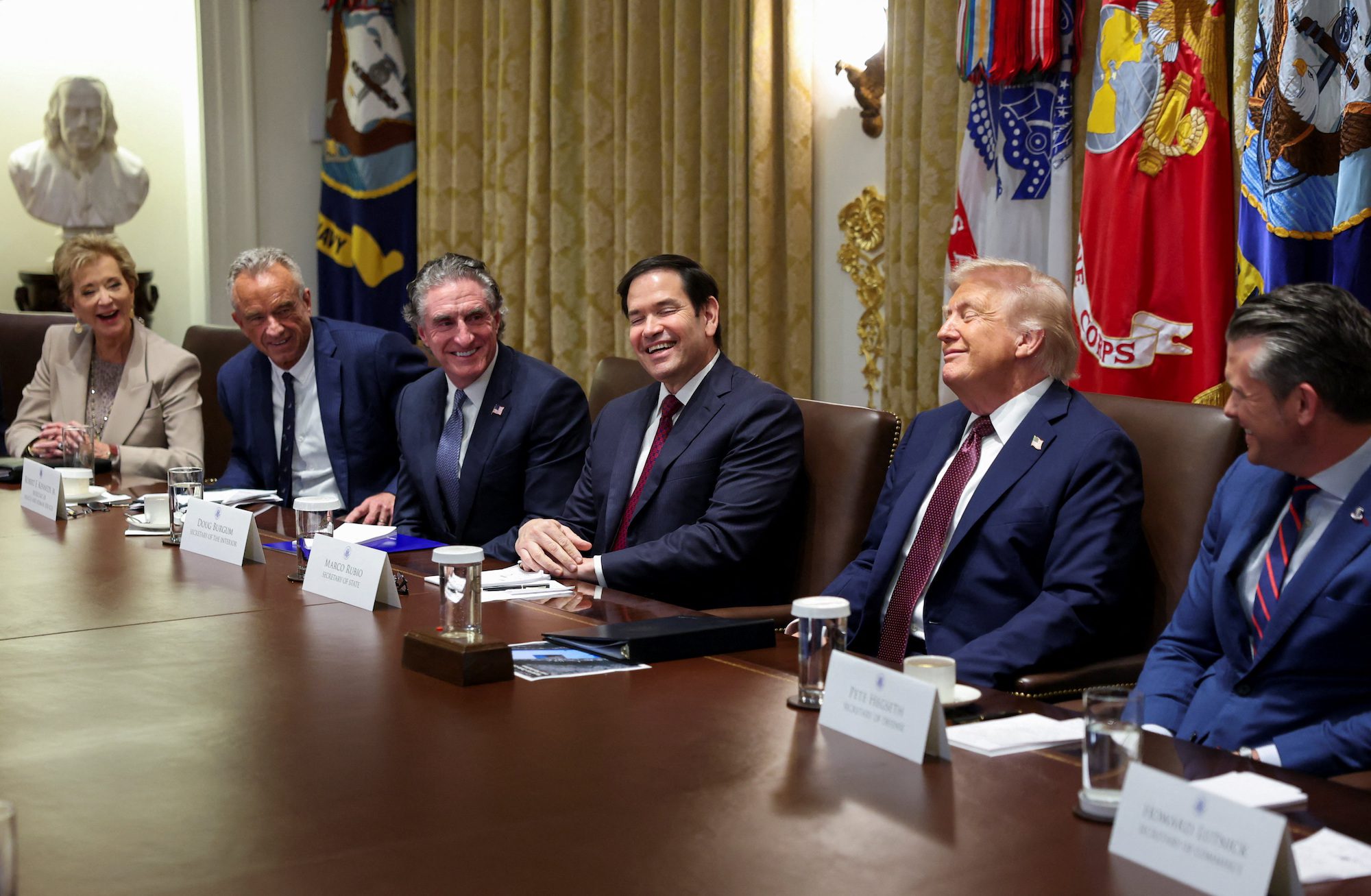 U.S. President Donald Trump, Secretary of State Marco Rubio, Defense Secretary Pete Hegseth, Interior Secretary Doug Burgum, U.S. Health and Human Services (HHS) Secretary Robert F. Kennedy, Jr. and Education Secretary Linda McMahon attend a cabinet meeting at the White House