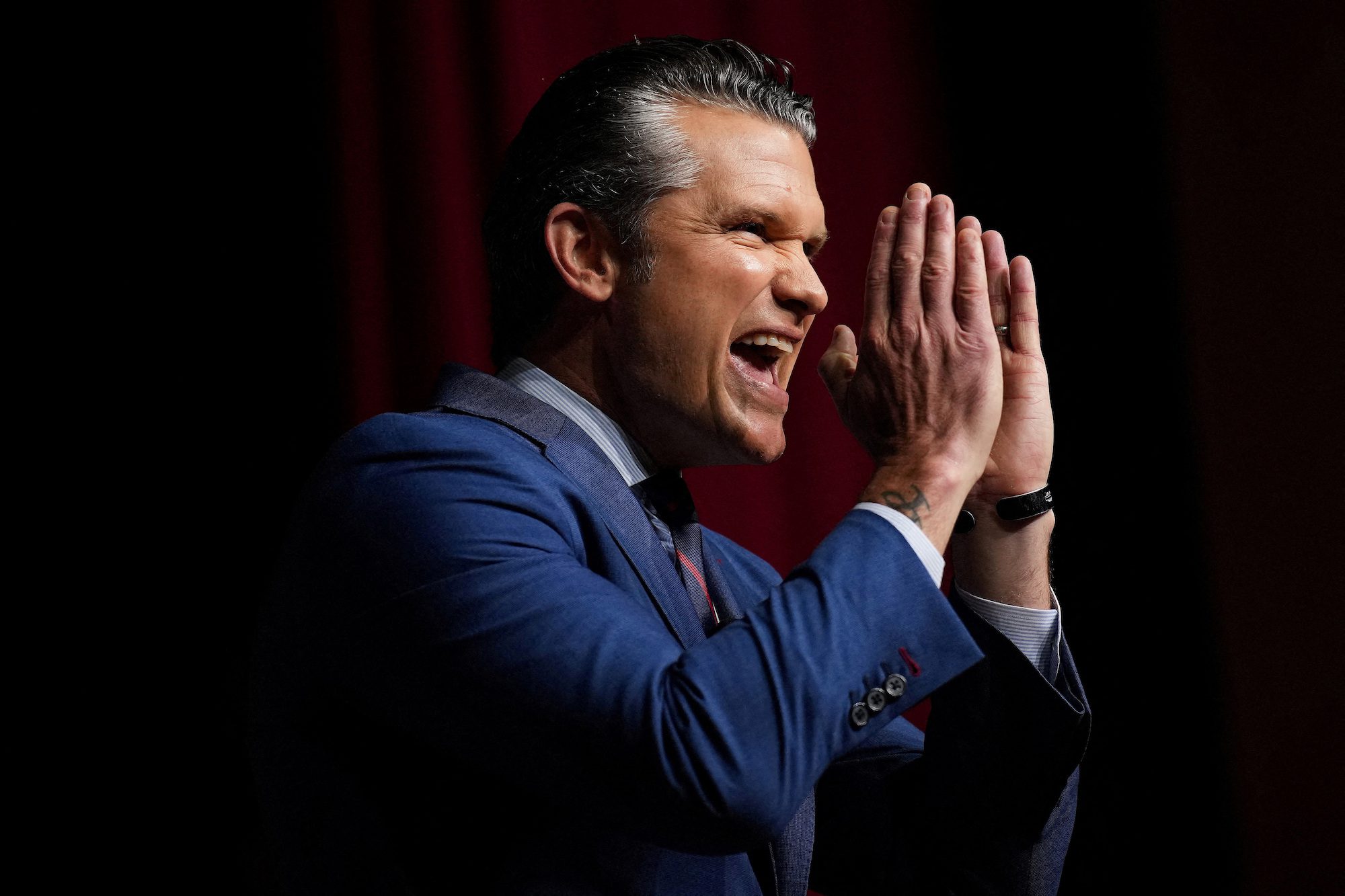 FILE PHOTO: U.S. Secretary of War Pete Hegseth speaks to senior military leaders at Marine Corps Base Quantico, Virginia, U.S., September 30, 2025