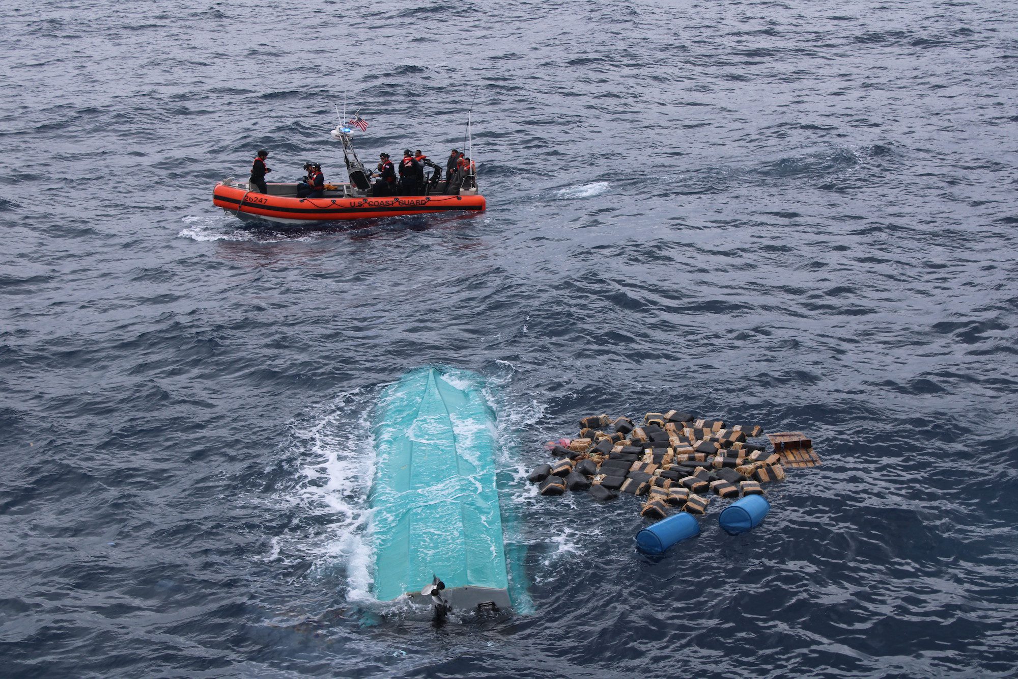 The crew of the U.S. Coast Guard Cutter Seneca (WMEC 906) recovers bales of cocaine after a suspected drug smuggling vessel capsized in the Pacific Ocean, Sept. 17, 2025. Seneca’s crew worked alongside interagency partners to interdict illicit narcotics in the international waters in the Eastern Pacific Ocean