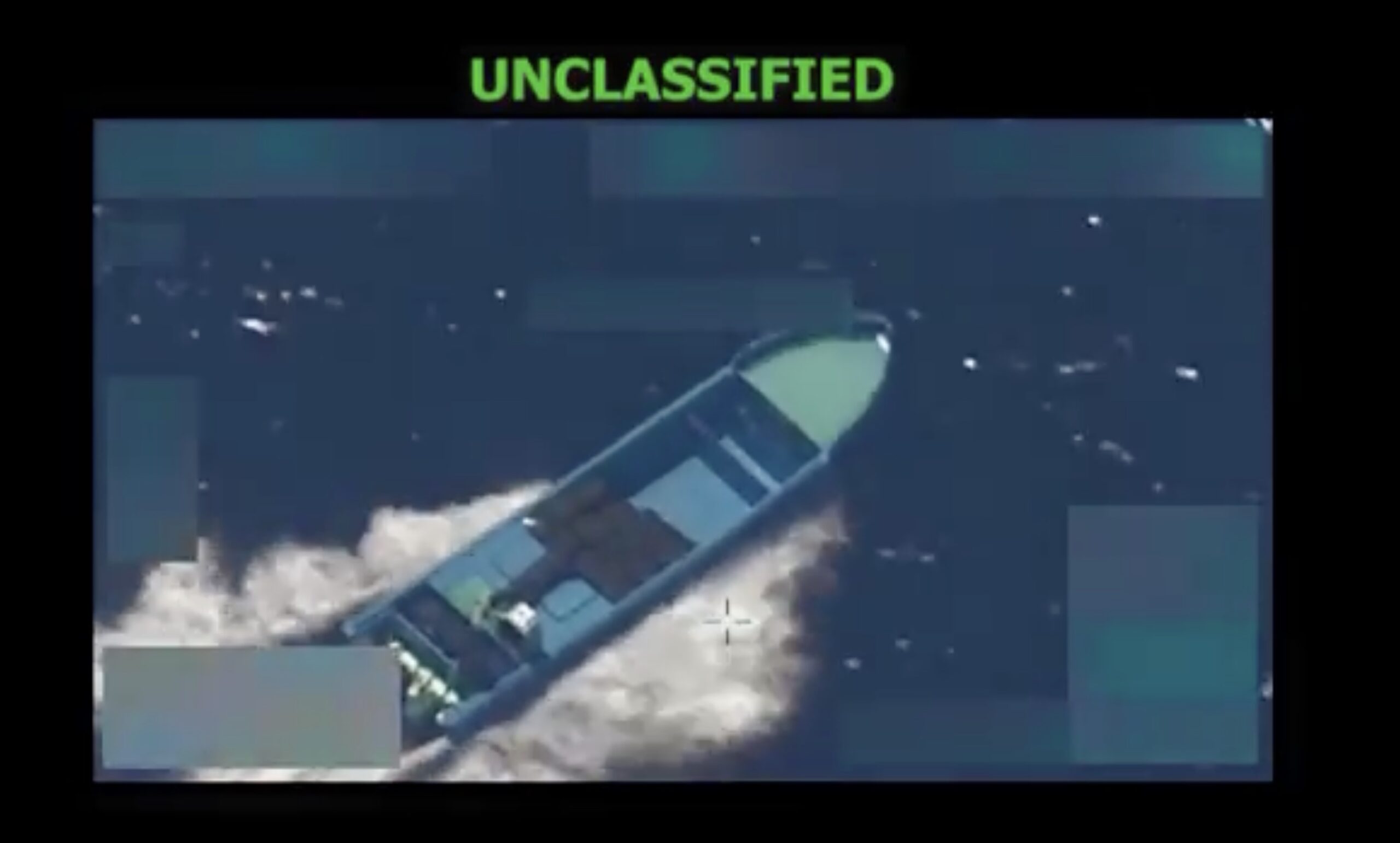 A screenshot from video showing a U.S. military strike on an alleged drug smuggling vessel in the Eastern Pacific. Video released Oct. 22, 2025