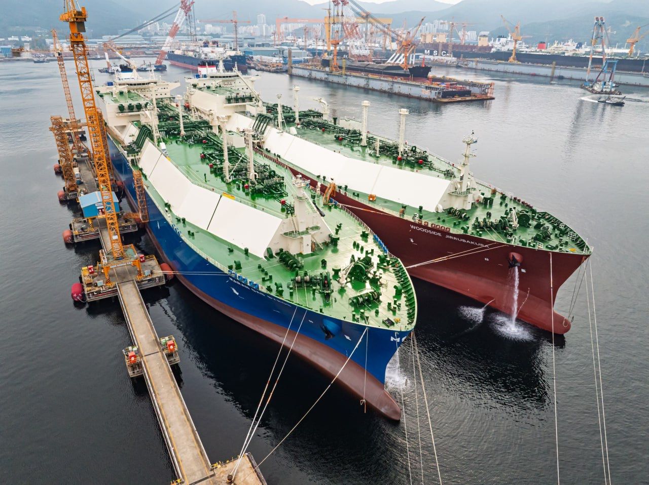The Maran Gas Syros conducts and LNG ship-to-ship transfer with the Woodside Jirrubakura
