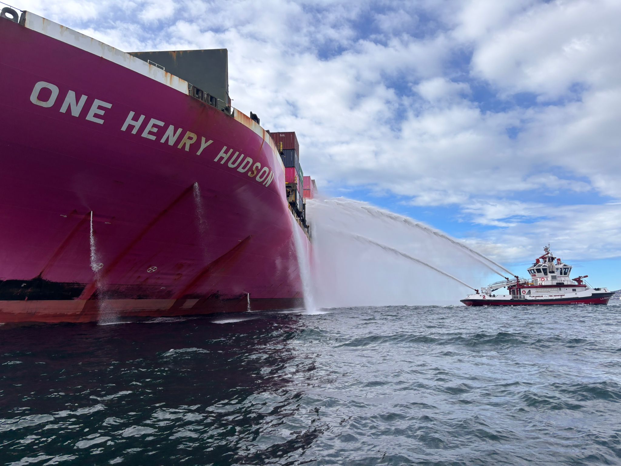 Los Angeles Fire Department fireboats are continuing firefighting operations to stop fire aboard cargo vessel One Henry Hudson off the Port of Los Angeles, Nov. 22, 2025