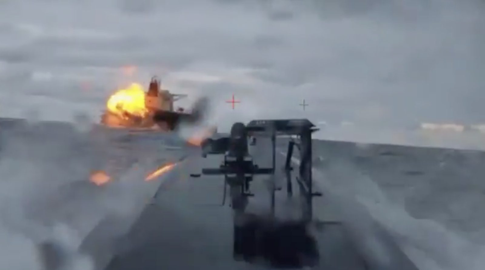 A screenshot of video purporting to show the oil tanker Dashan being struck by an attack drone, with explosions erupting near the vessel's stern.