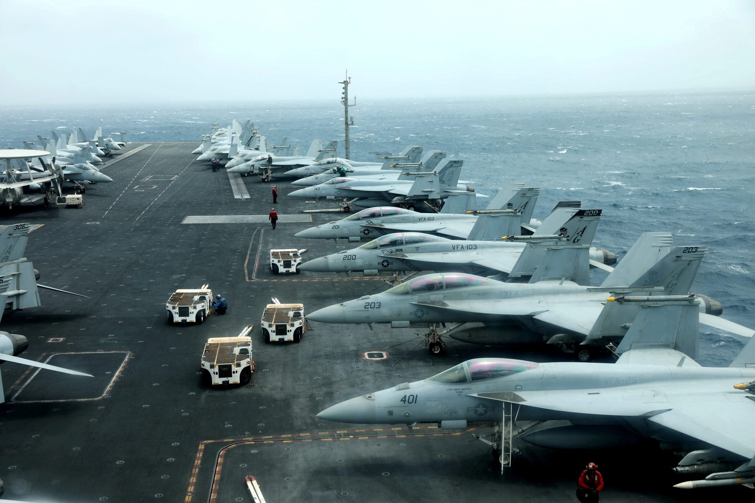 F/A-18F aircrafts are seen on the deck of USS Abraham Lincoln in the Gulf of Oman near the Strait of Hormuz