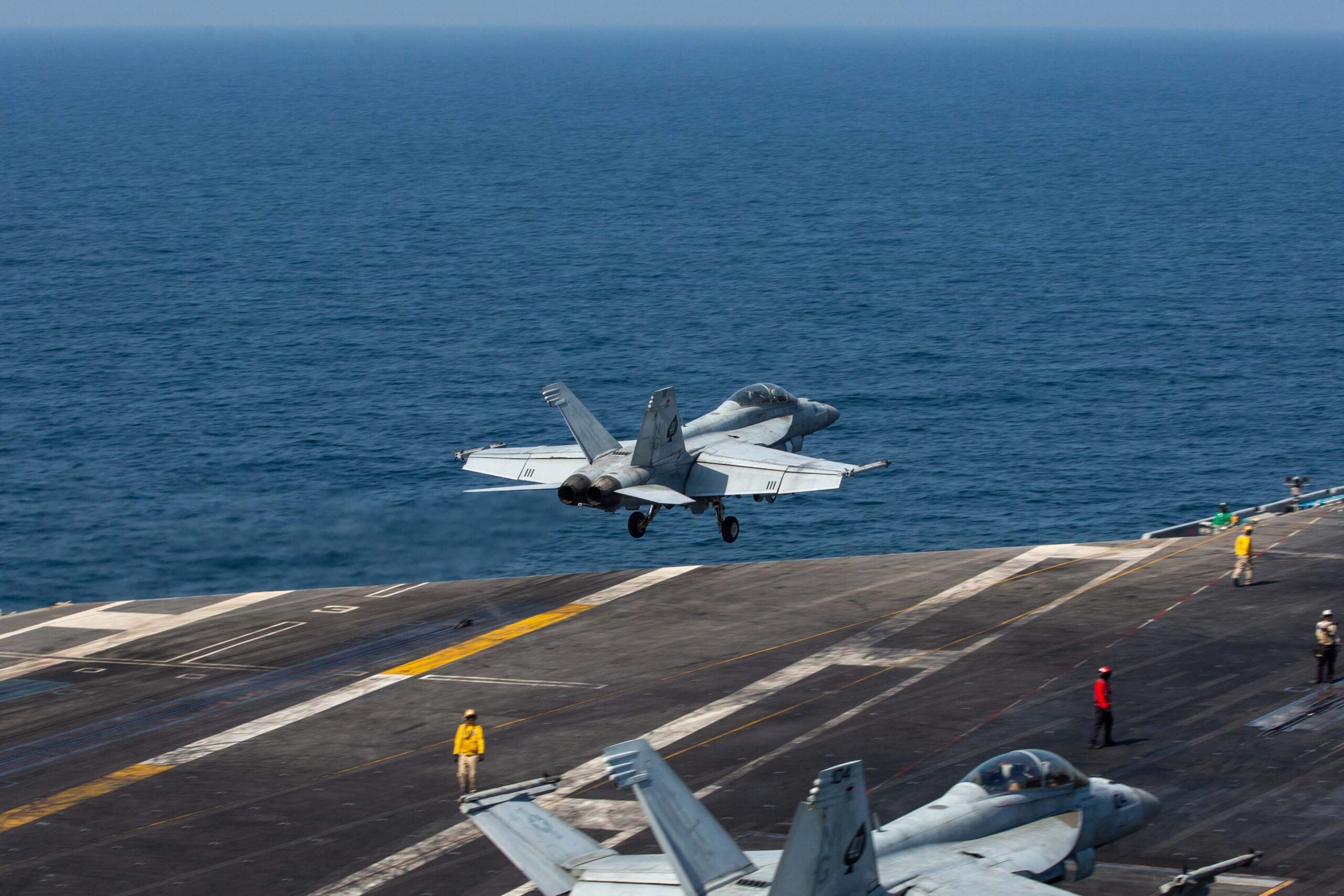 An F/A-18F Super Hornet, attached to Strike Fighter Squadron (VFA) 41, launches from the flight deck of Nimitz-class aircraft carrier USS Abraham Lincoln (CVN 72) in support of Operation Epic Fury