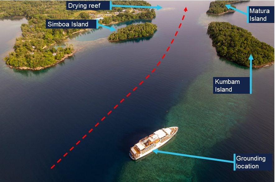 Aerial view of the entry to Dregerhafen with Coral Adventurer aground
