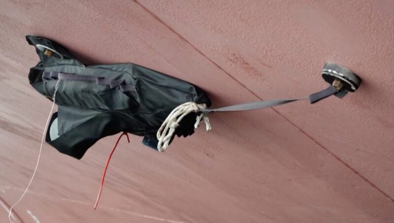 A still image from a video released by Russian state media shows what is said to be a mine found on the hull of the Liberia-flagged tanker Arrhenius in the Baltic Sea port of Ust-Luga