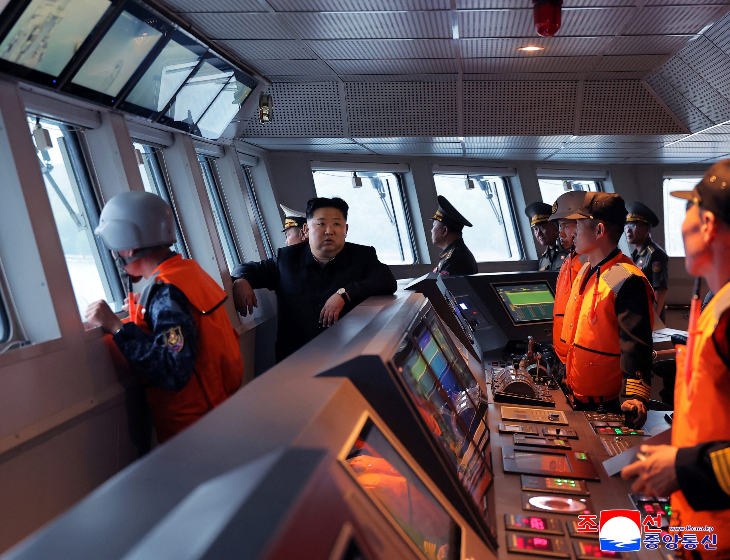 North Korean leader Kim Jong Un visits naval vessel.