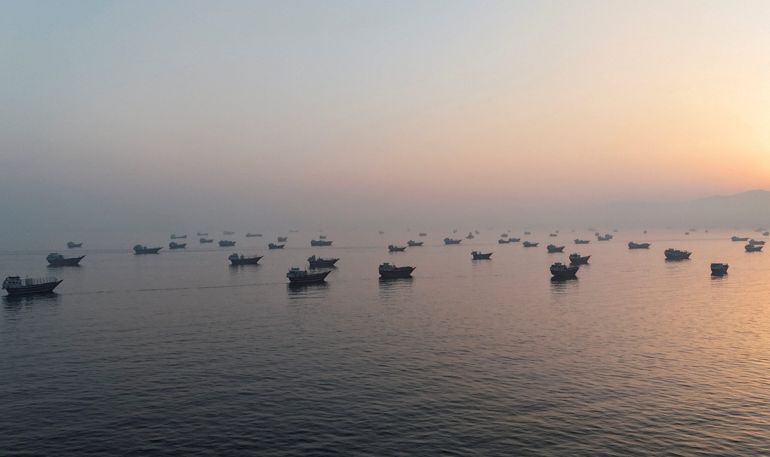 A drone view shows vessels in the Strait of Hormuz, as seen from Musandam