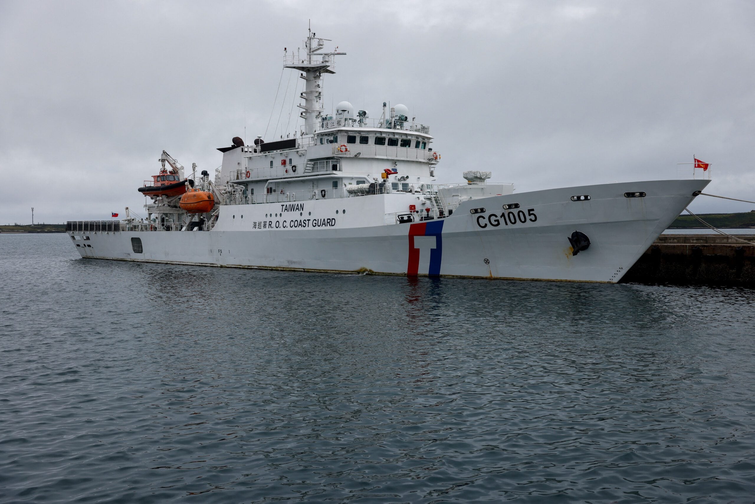 A Taiwan Coast Guard vessel, CG1005, docks at a port in Penghu