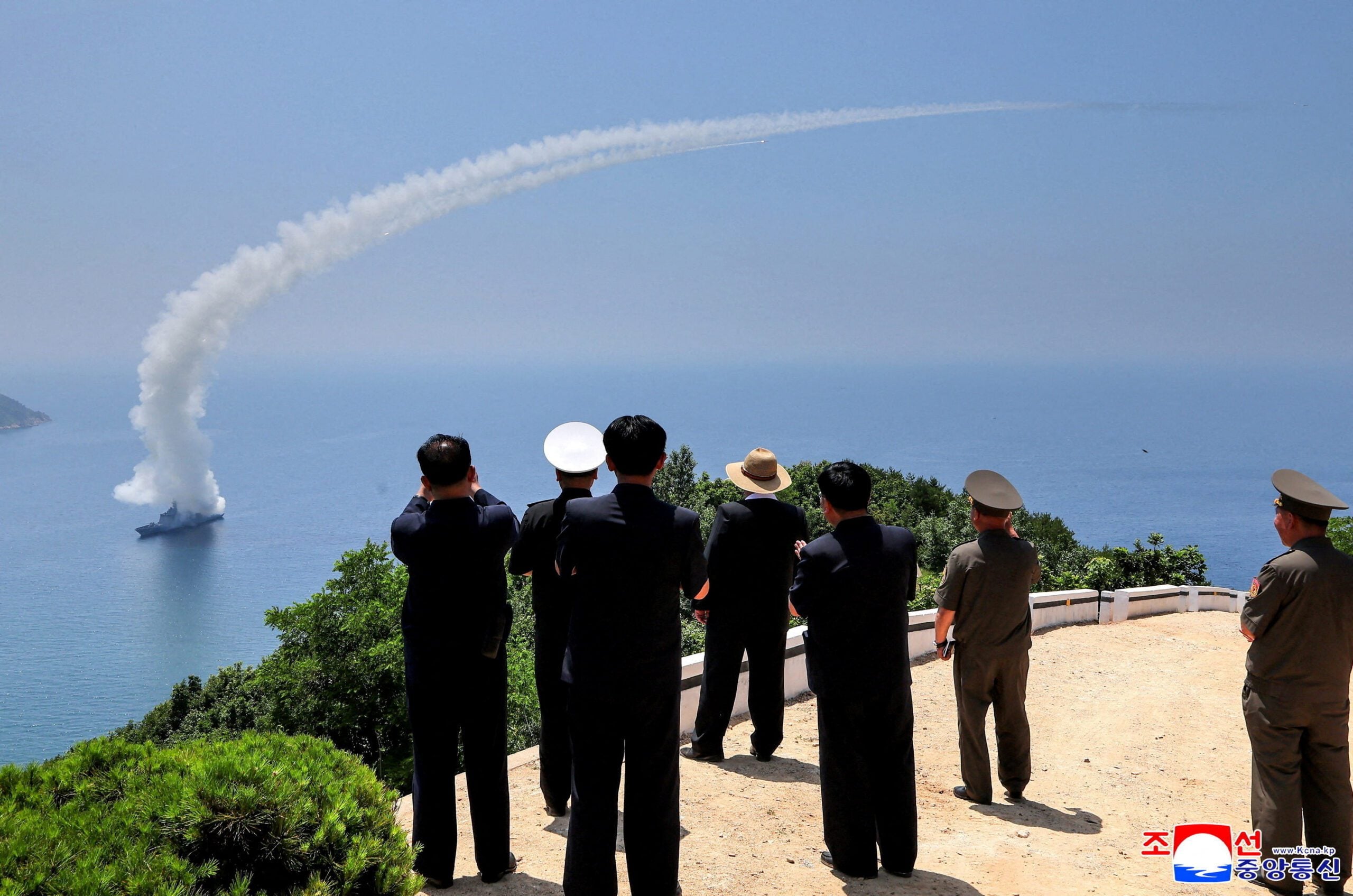 North Korean leader Kim Jong Un observes an assessment of the newly built naval destroyer Kang Kon's combat systems