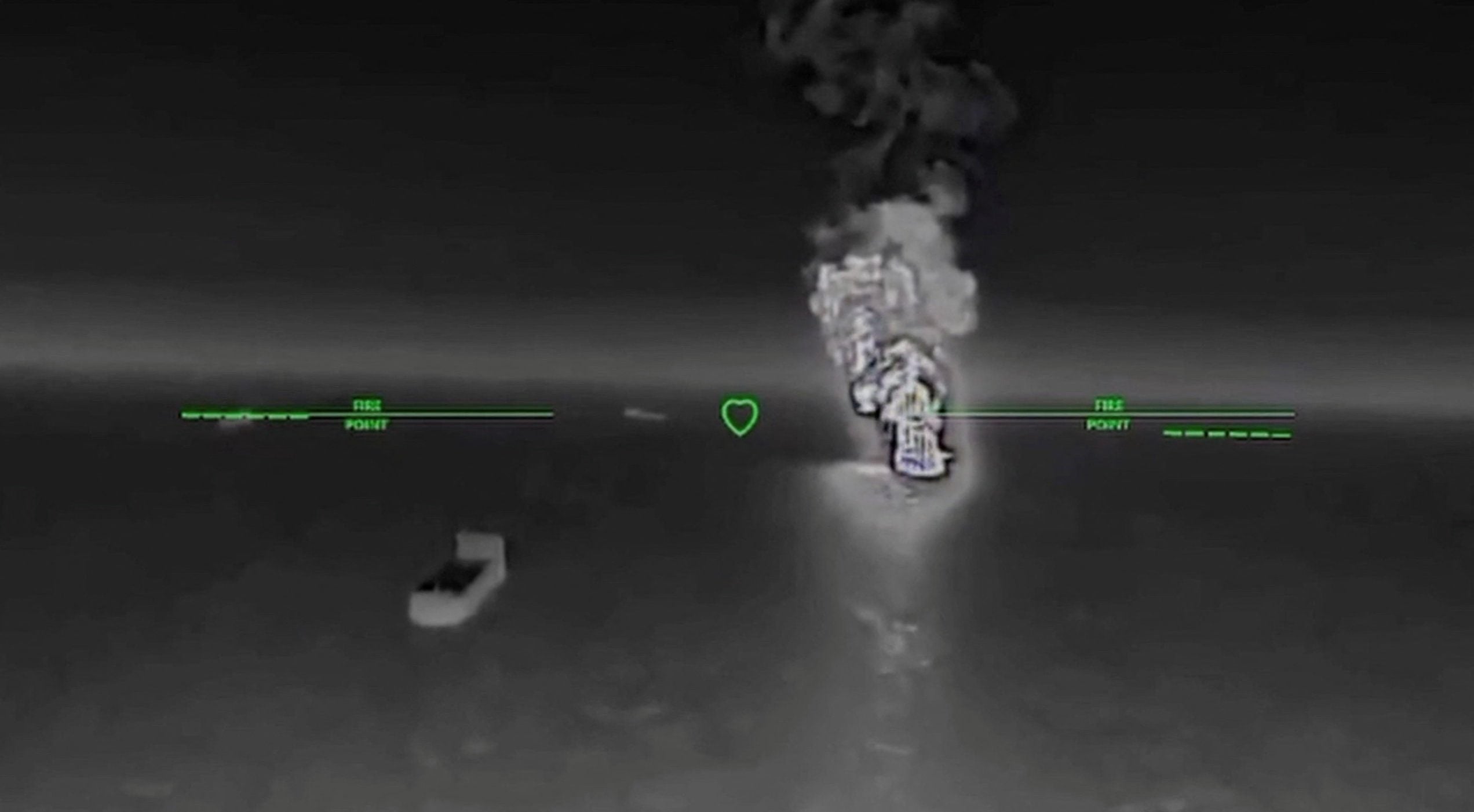 Smoke rises after what the Ukranian authorities say was during a strike as Ukrainian UAVs hit a Russian dark fleet tanker at a location given as Sea of Azov in this screengrab taken from a handout video released on July 7, 2026