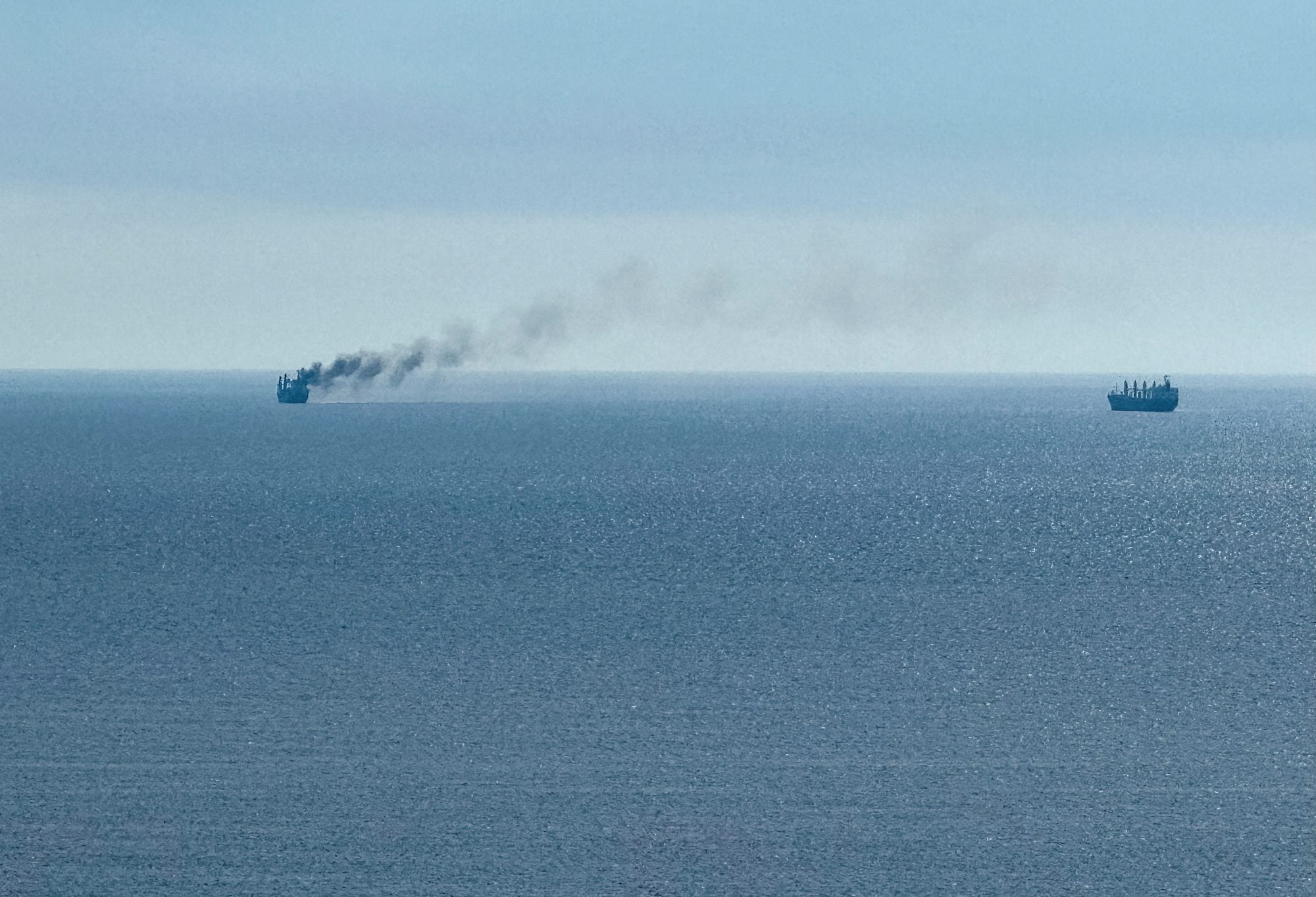 A civilian vessel is on fire, as Ukraine's navy spokesman reported a Russian military strike on a civilian vessel, amid Russia's attack on Ukraine, near the Black Sea port of Odesa