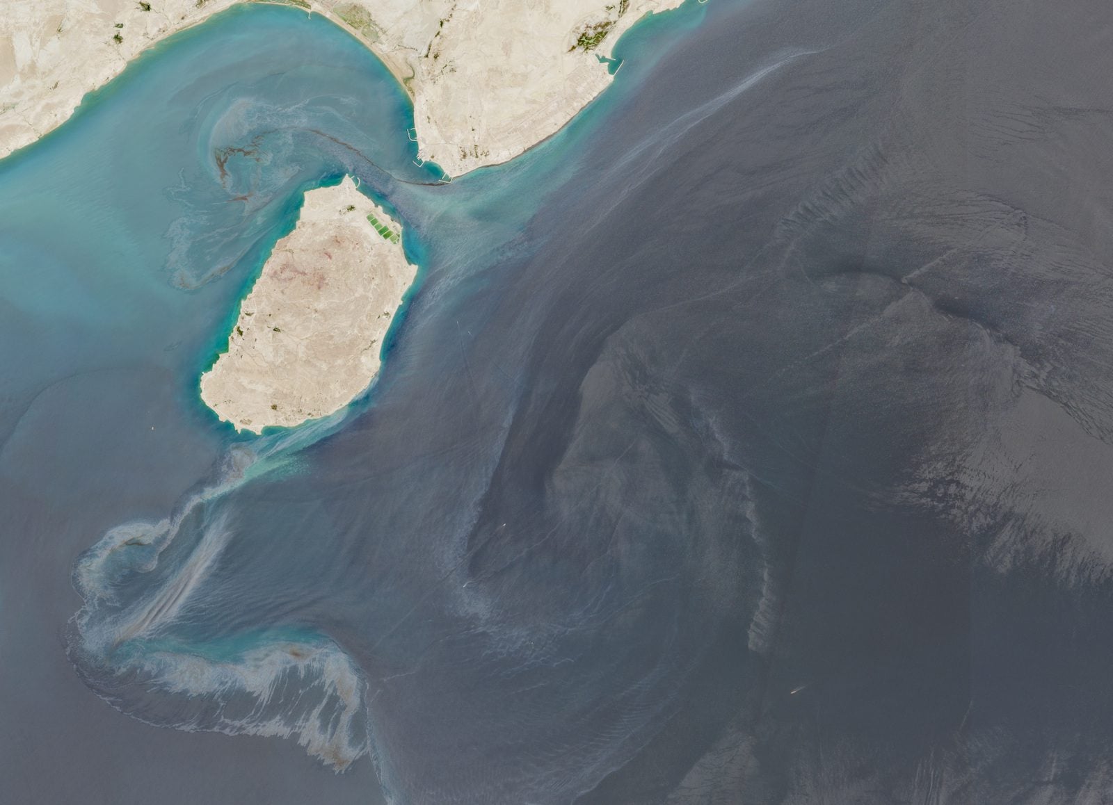 A satellite image shows Qeshm Island following suspected oil spills at sea, off the coast of Iran, August 10, 2026