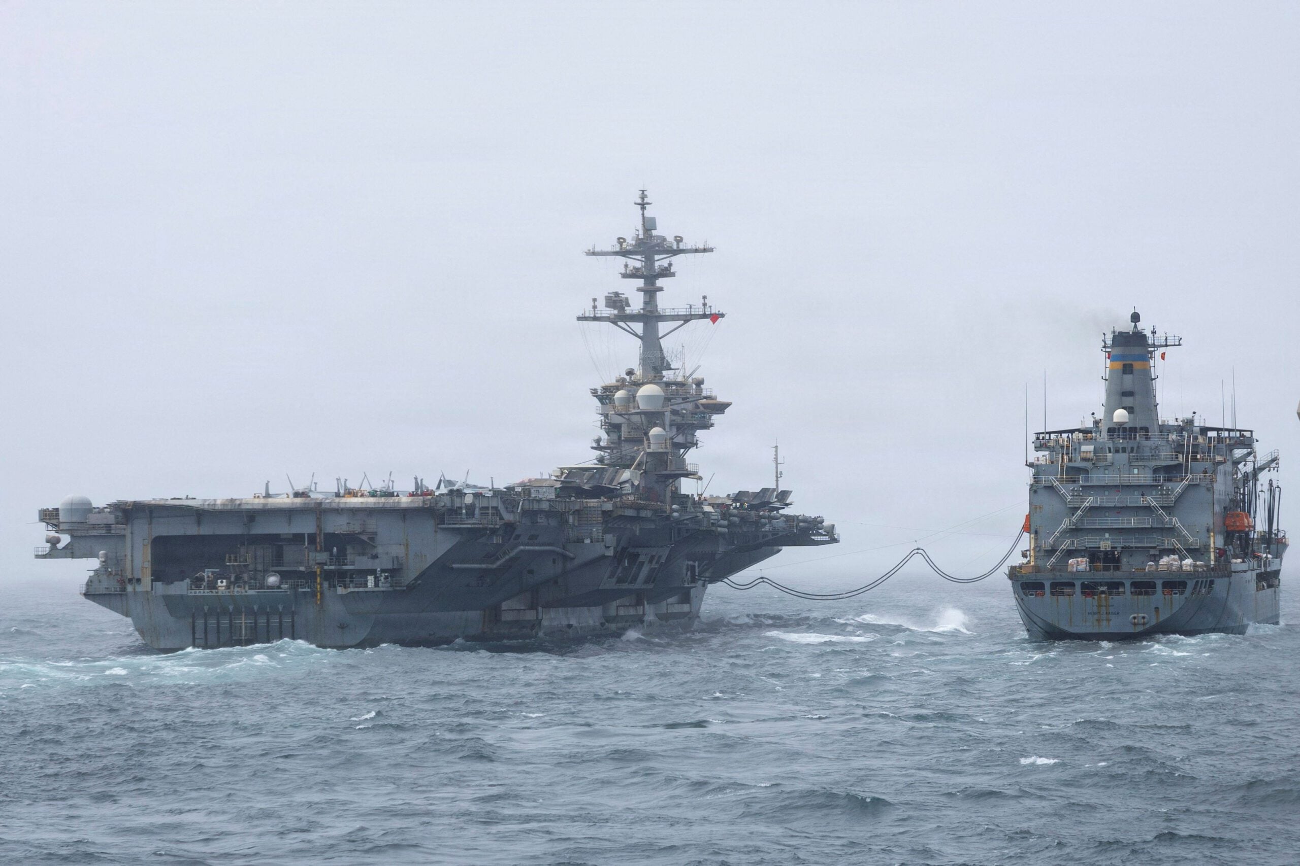 USS Abraham Lincoln Conducts replenishment-at-sea with USNS Henry J. Kaiser