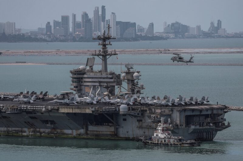 The U.S. Navy Nimitz-class aircraft carrier USS Abraham Lincoln sails toward Laem Chabang Port before docking
