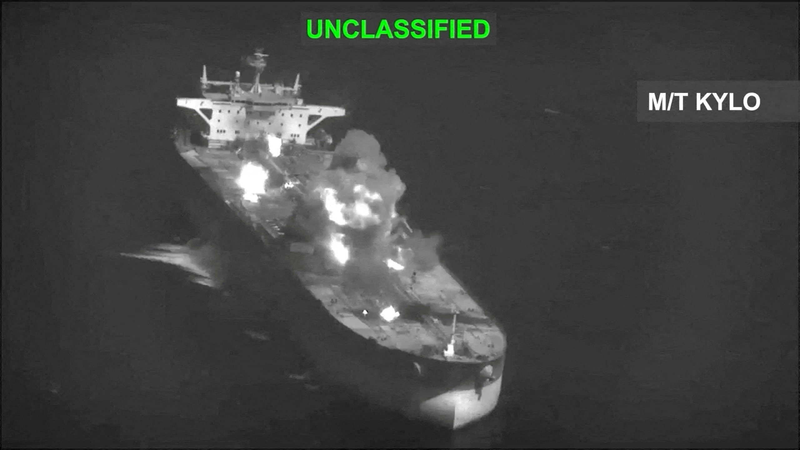 Fire and smoke rise during what U.S. Central Command (CENTCOM) says are strikes on Iranian oil carriers, at an unknown location