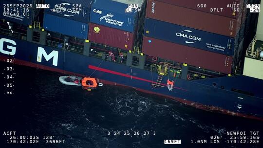 Cargo ship Sofrana Surville rescues sailors from a life raft after their yacht struck a whale north of Norfolk Island.