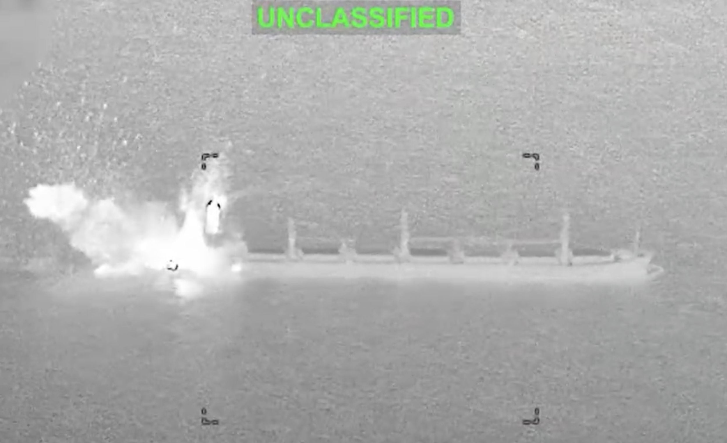 Thermal imagery showing an explosion near the stern of a cargo vessel in the Gulf of Oman during a U.S. military strike on October 10, 2026.