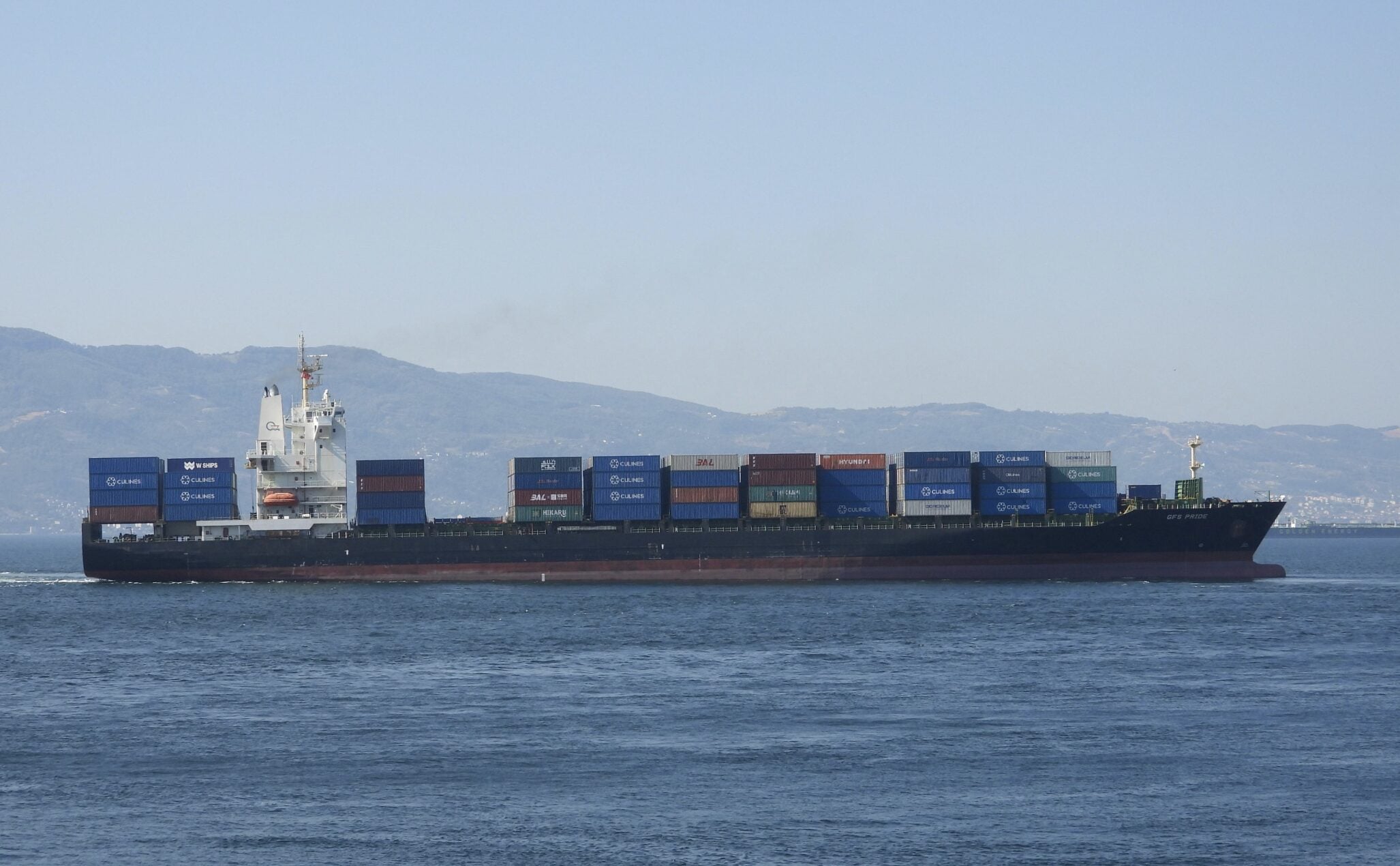 Container Ship Sinks Near Hormuz After Being Hit by Projectile, Sources Say