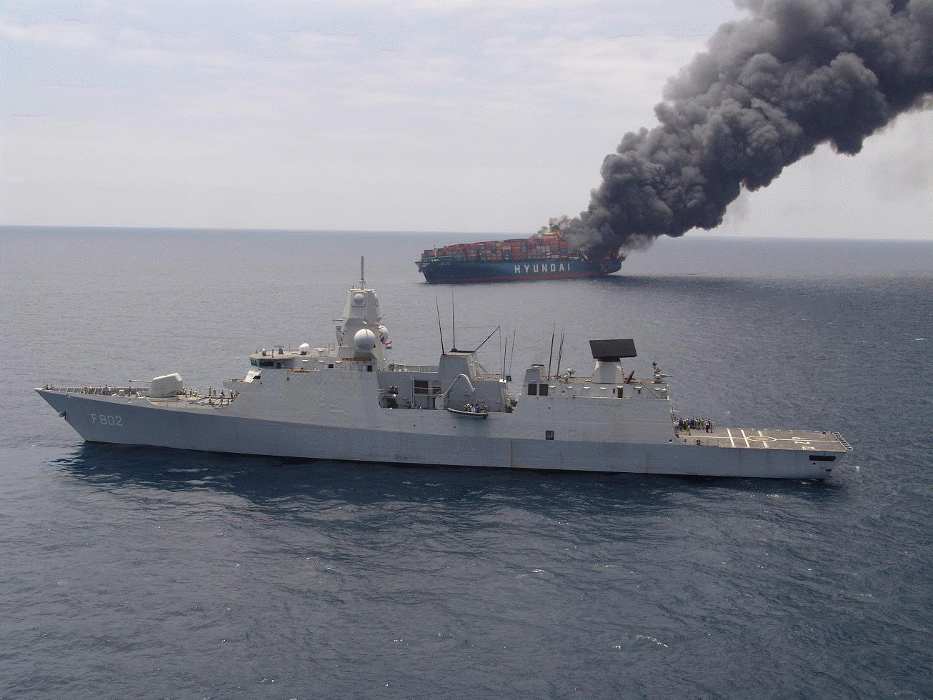 Navy Ship and Hyundai Fortune on Fire
